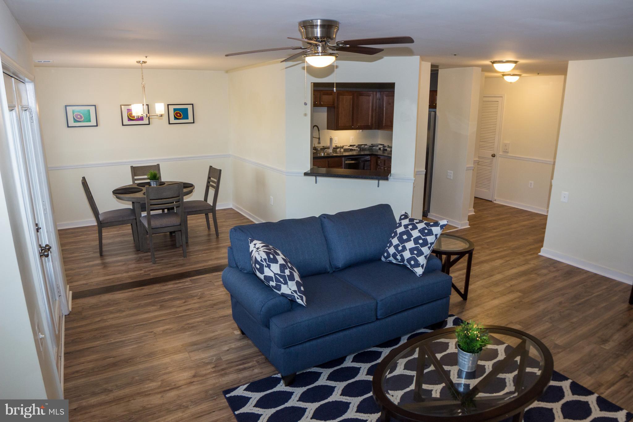 325 Pleasanton Road, Unit B22 Westminster, MD 21157 - Photo 3 of 26 Spacious living room with separate dining room