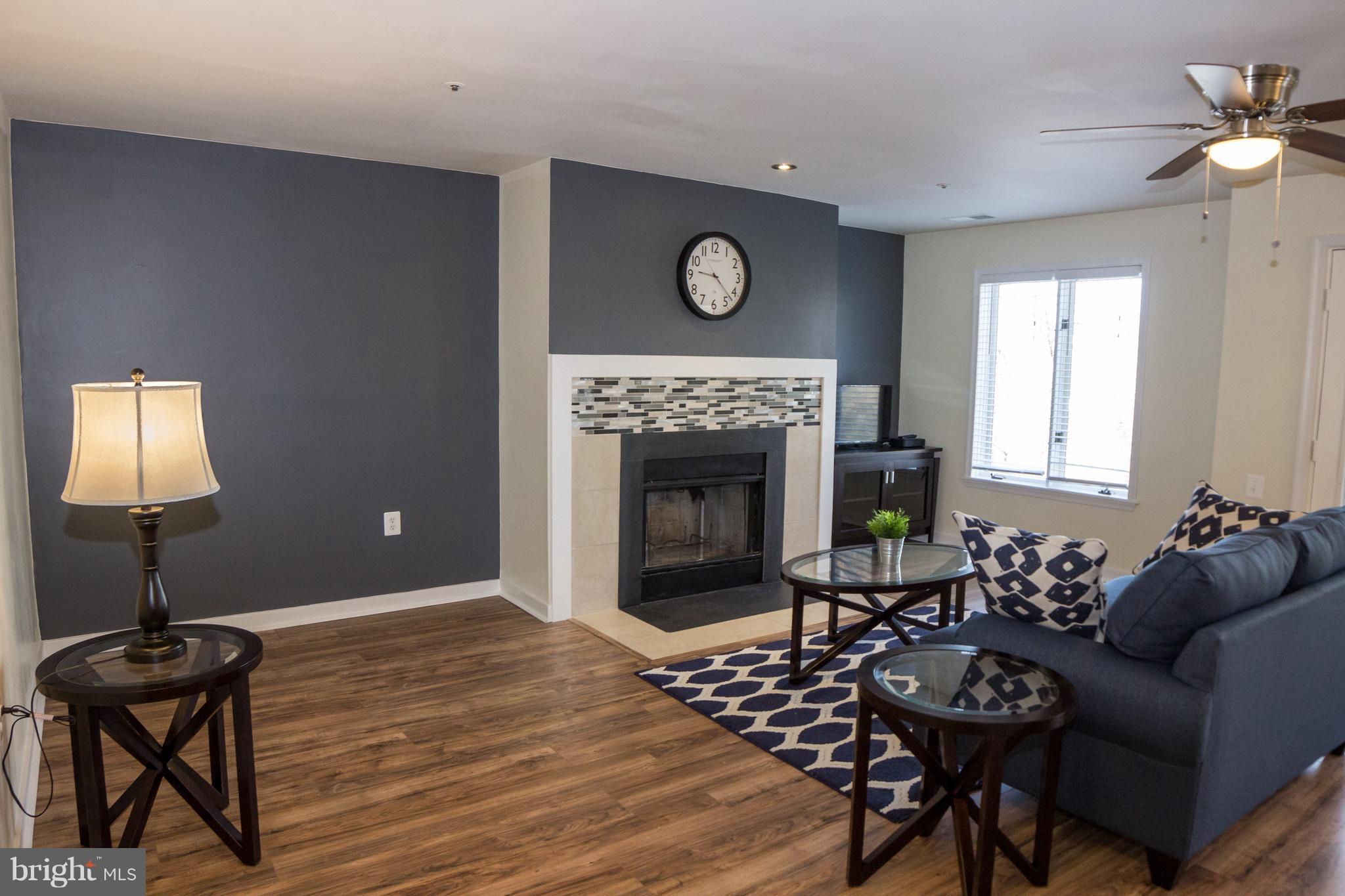 325 Pleasanton Road, Unit B22 Westminster, MD 21157 - Photo 4 of 26 There's a wood burning fireplace in the LR!
