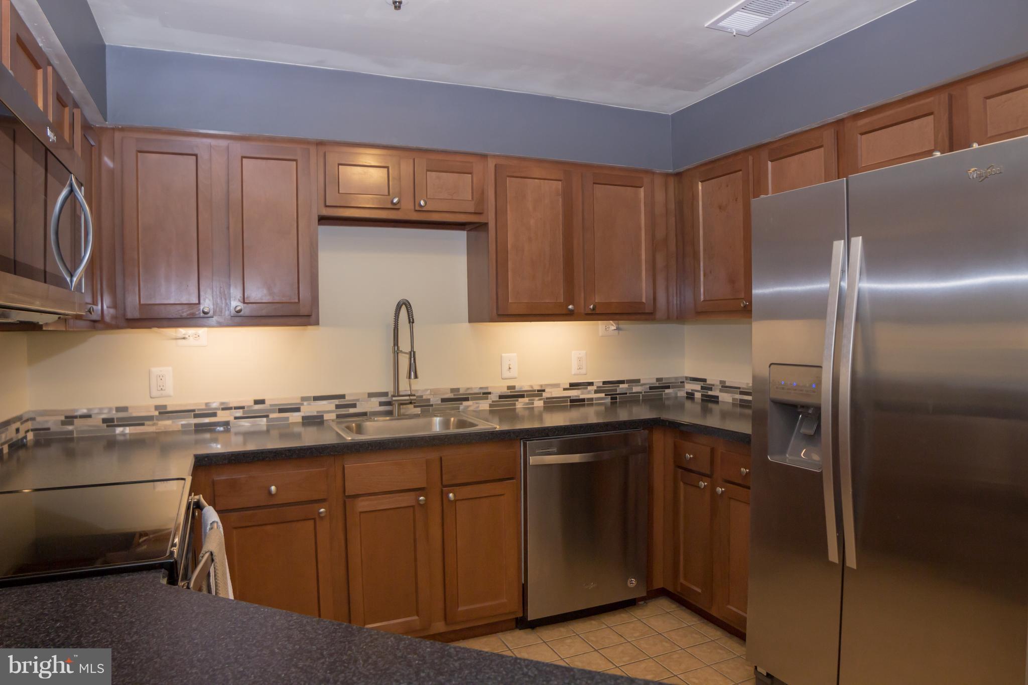 325 Pleasanton Road, Unit B22 Westminster, MD 21157 - Photo 5 of 26 This fabulous kitchen has new cabinets!