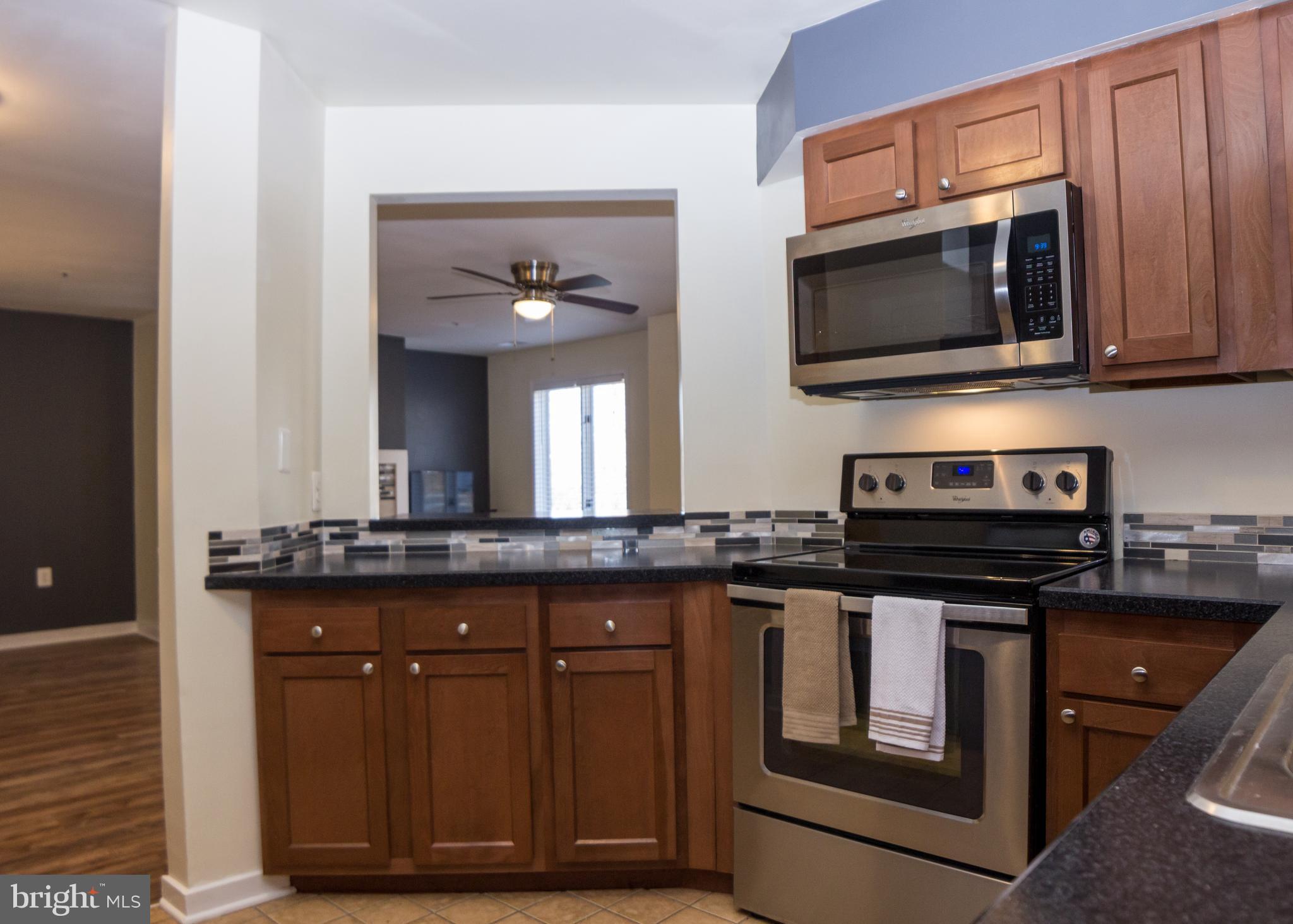 325 Pleasanton Road, Unit B22 Westminster, MD 21157 - Photo 7 of 26 There is a pass-through breakfast bar!