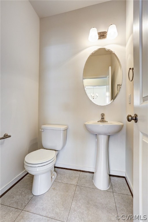 7119 Appelman Road Chesterfield, VA 23832 - Photo 6 of 18 a bathroom with a toilet sink and mirror