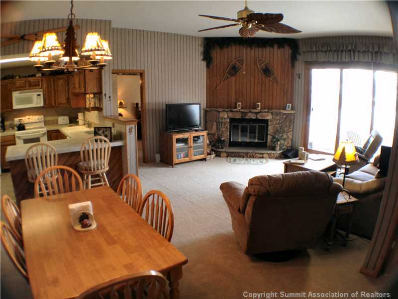 89310 Ryan Gulch Road, Unit 101 Silverthorne, CO 80498 - Photo 19 of 25 Living Room.