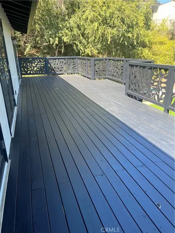 a view of a park with large trees