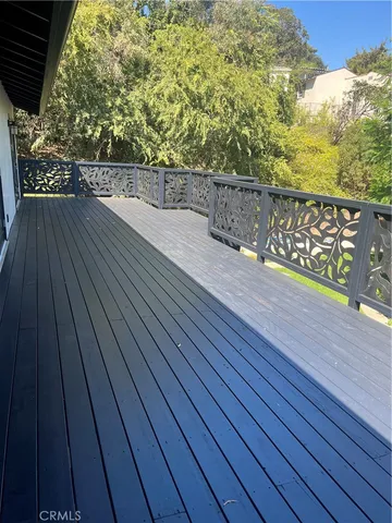 a view of a room that has a window in it