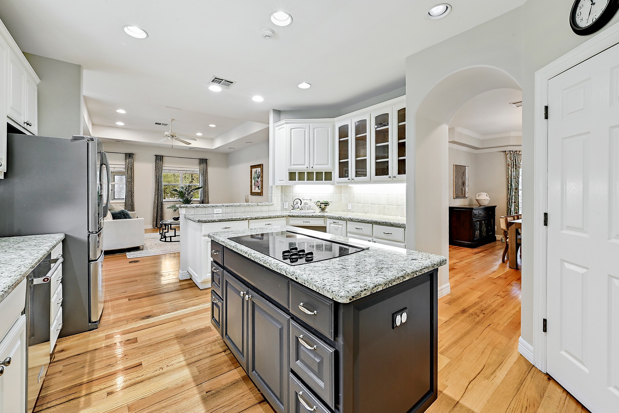 22 Hedgebrook Way The Hills, TX 78738 - Photo 11 of 40 a kitchen with stainless steel appliances granite countertop a stove and a refrigerator