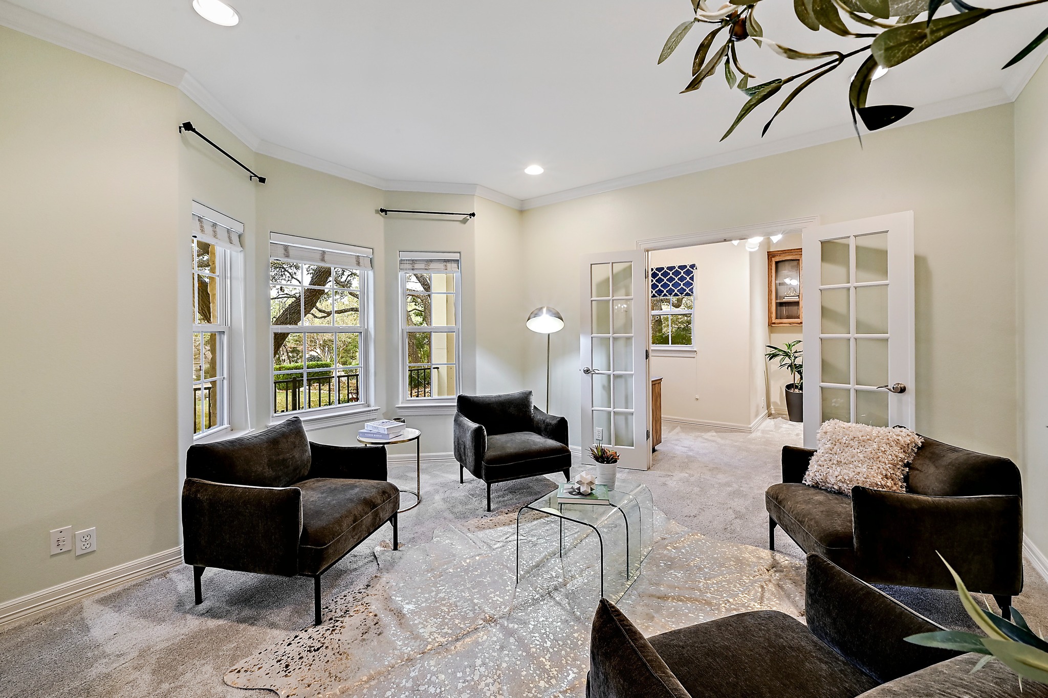 22 Hedgebrook Way The Hills, TX 78738 - Photo 14 of 40 a living room with furniture potted plant and a window