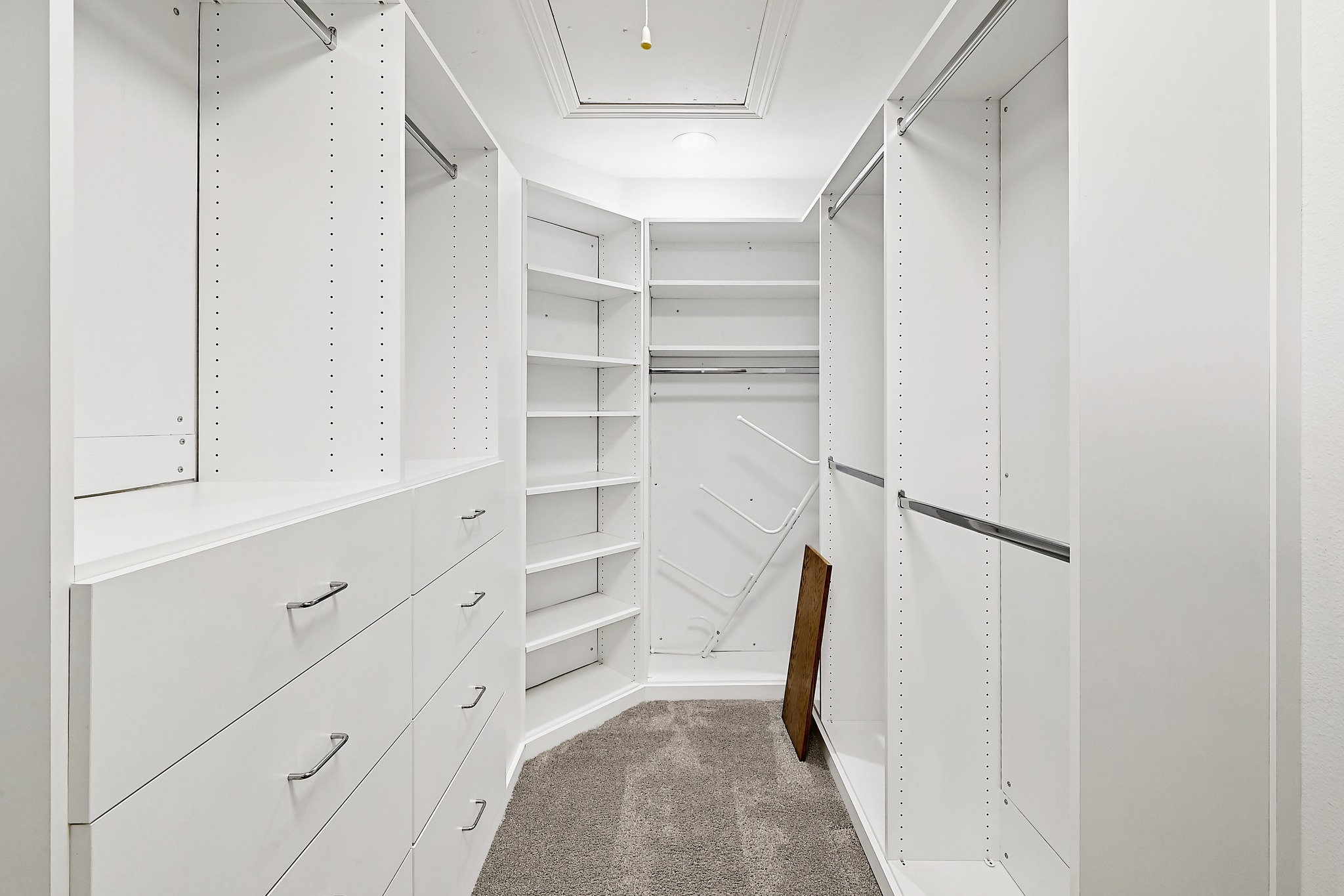 22 Hedgebrook Way The Hills, TX 78738 - Photo 26 of 40 a view of walk in closet with empty racks