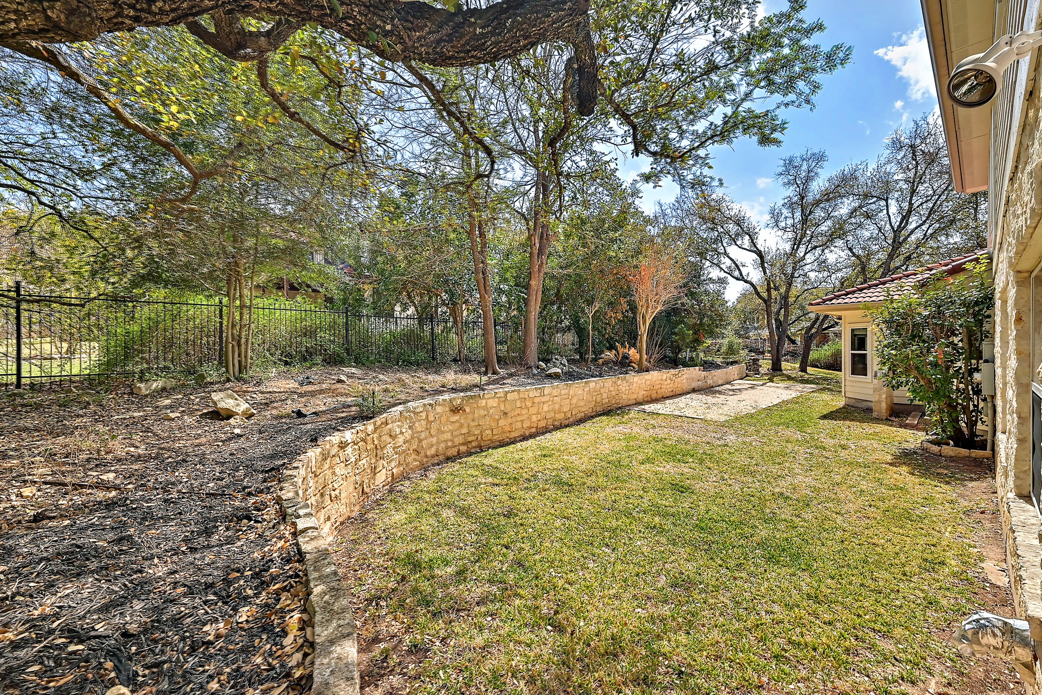22 Hedgebrook Way The Hills, TX 78738 - Photo 38 of 40 a swimming pool with trees in the background