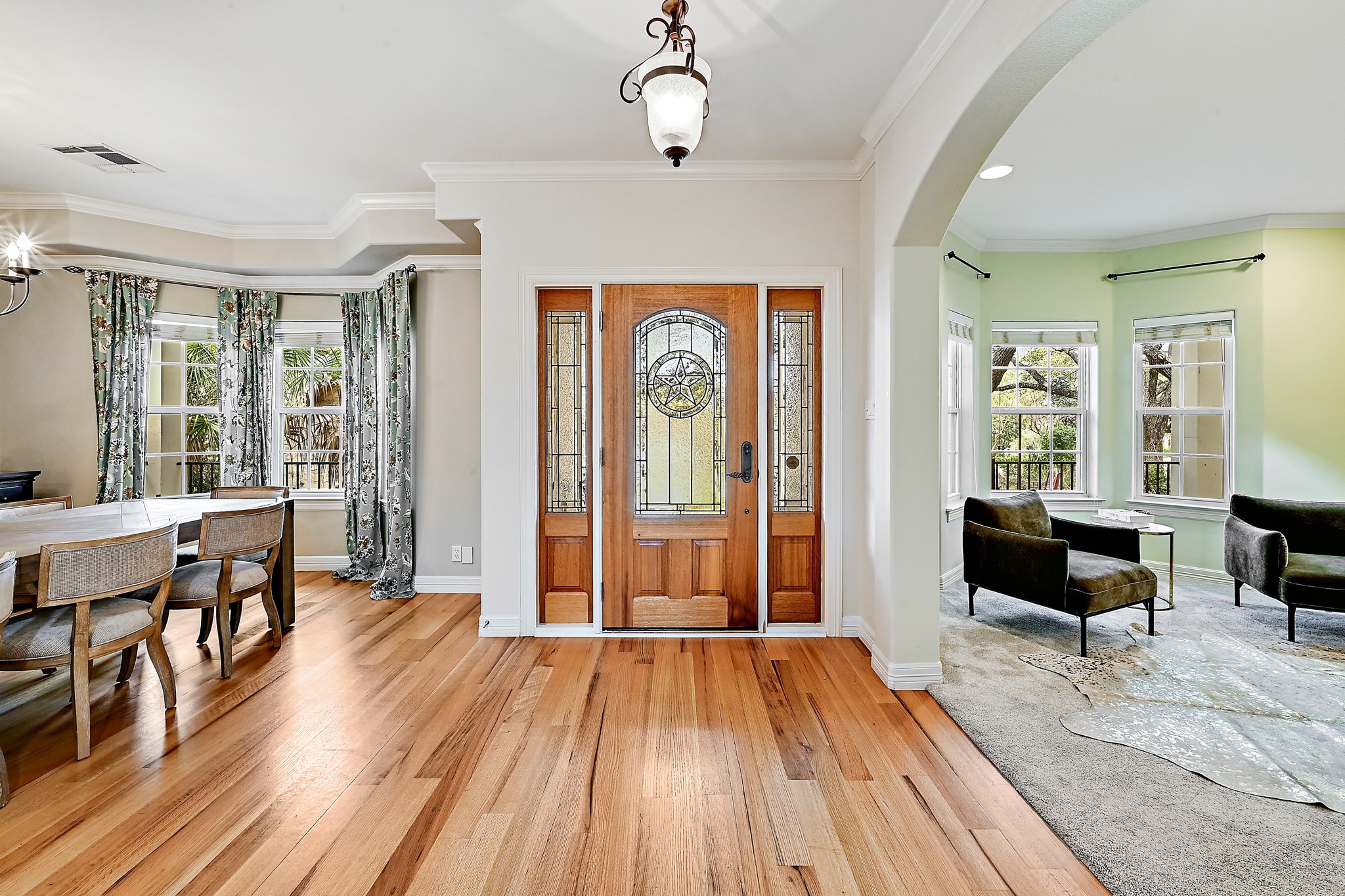 22 Hedgebrook Way The Hills, TX 78738 - Photo 4 of 40 a view of a livingroom with furniture window and wooden floor