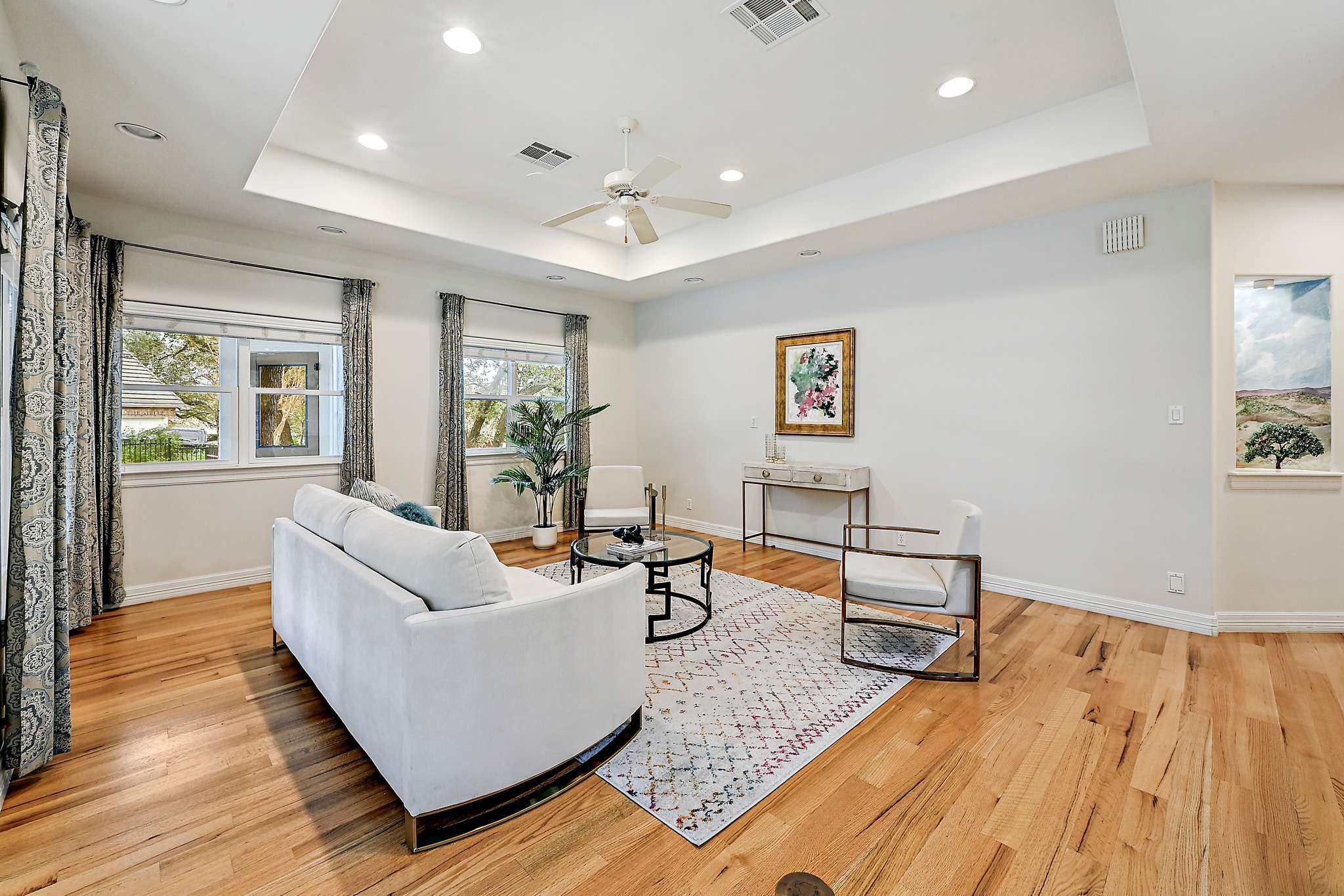 22 Hedgebrook Way The Hills, TX 78738 - Photo 6 of 40 a living room with furniture and wooden floor