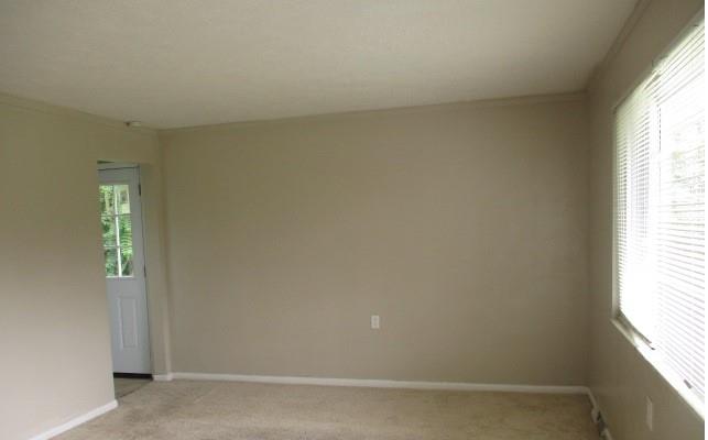 151 Cochran Drive Monaca, PA 15061 - Photo 2 of 7 an empty room with windows