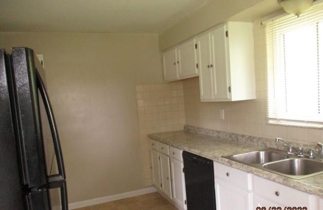 151 Cochran Drive Monaca, PA 15061 - Photo 4 of 7 a kitchen with a sink and cabinets