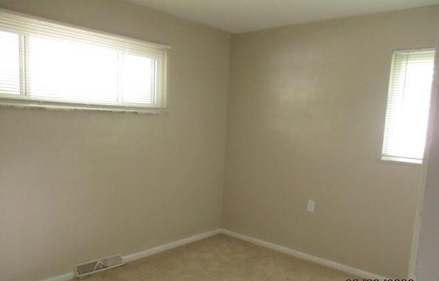 151 Cochran Drive Monaca, PA 15061 - Photo 6 of 7 an empty room with a window