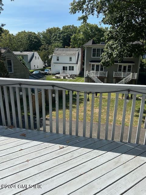 48 Pemberwick Road, Unit 3 Greenwich, CT 06831 - Photo 17 of 18 a view of balcony with wooden floor and fence
