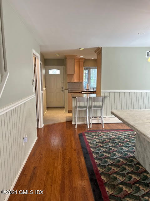 48 Pemberwick Road, Unit 3 Greenwich, CT 06831 - Photo 3 of 18 a living room with a rug and a wooden floor