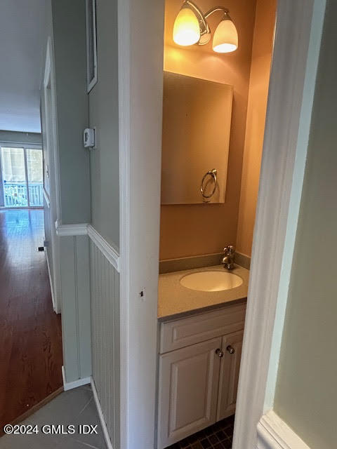 48 Pemberwick Road, Unit 3 Greenwich, CT 06831 - Photo 7 of 18 a bathroom with a sink and a mirror