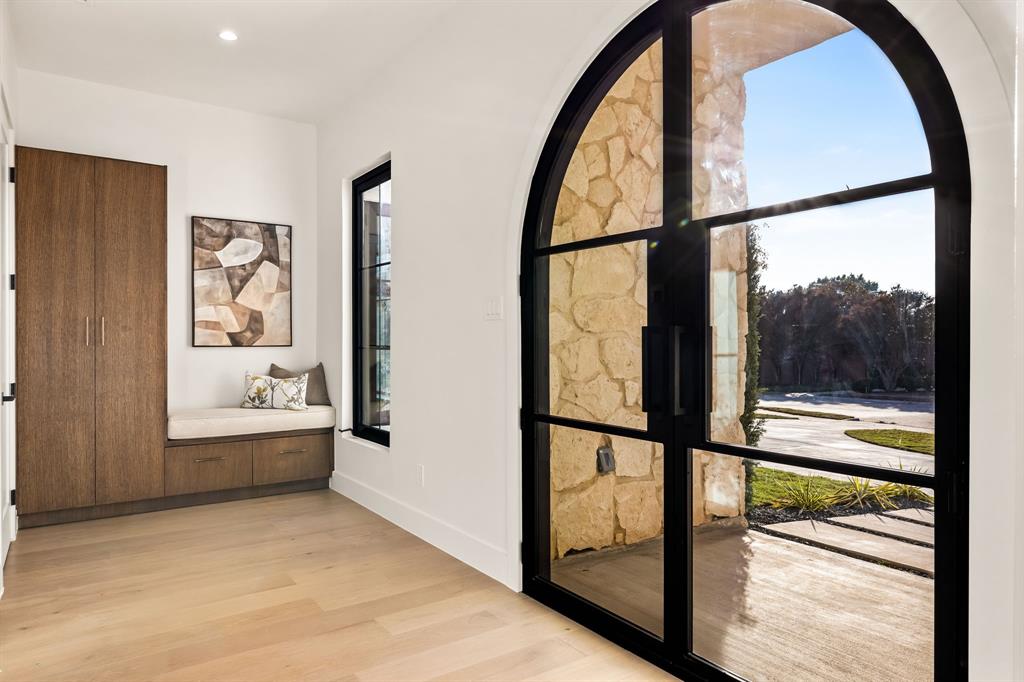 702 Mockingbird Lane Coppell, TX 75019 - Photo 5 of 32 Hallway with light wood-style flooring and recessed lighting