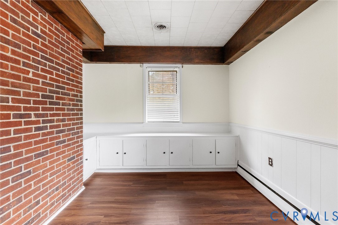 9303 Edson Road Henrico, VA 23229 - Photo 16 of 31 a view of an empty room with wooden floor and a window