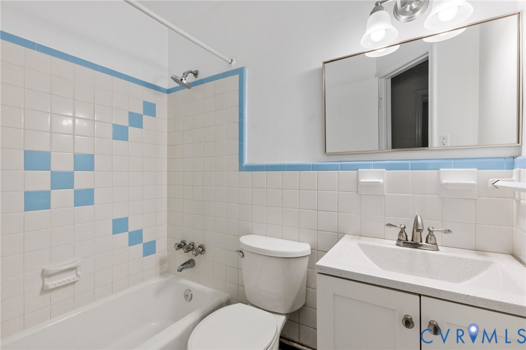 9303 Edson Road Henrico, VA 23229 - Photo 22 of 31 a bathroom with a sink toilet and shower