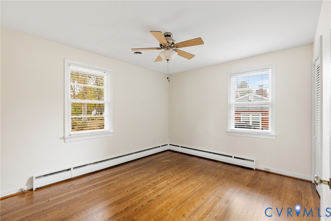 9303 Edson Road Henrico, VA 23229 - Photo 23 of 31 a view of an empty room with wooden floor and a window