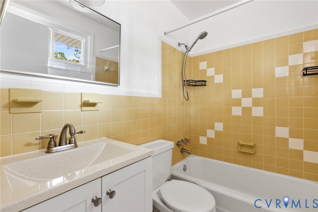 9303 Edson Road Henrico, VA 23229 - Photo 26 of 31 a bathroom with a sink a toilet and shower