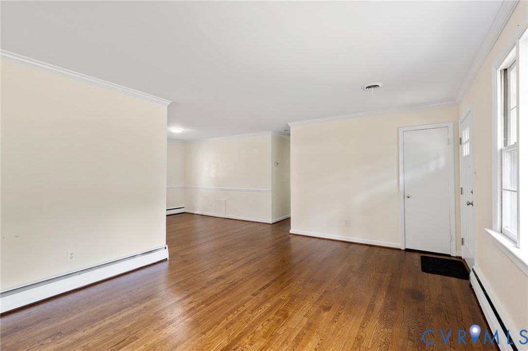 9303 Edson Road Henrico, VA 23229 - Photo 8 of 31 a view of an empty room with wooden floor and closet