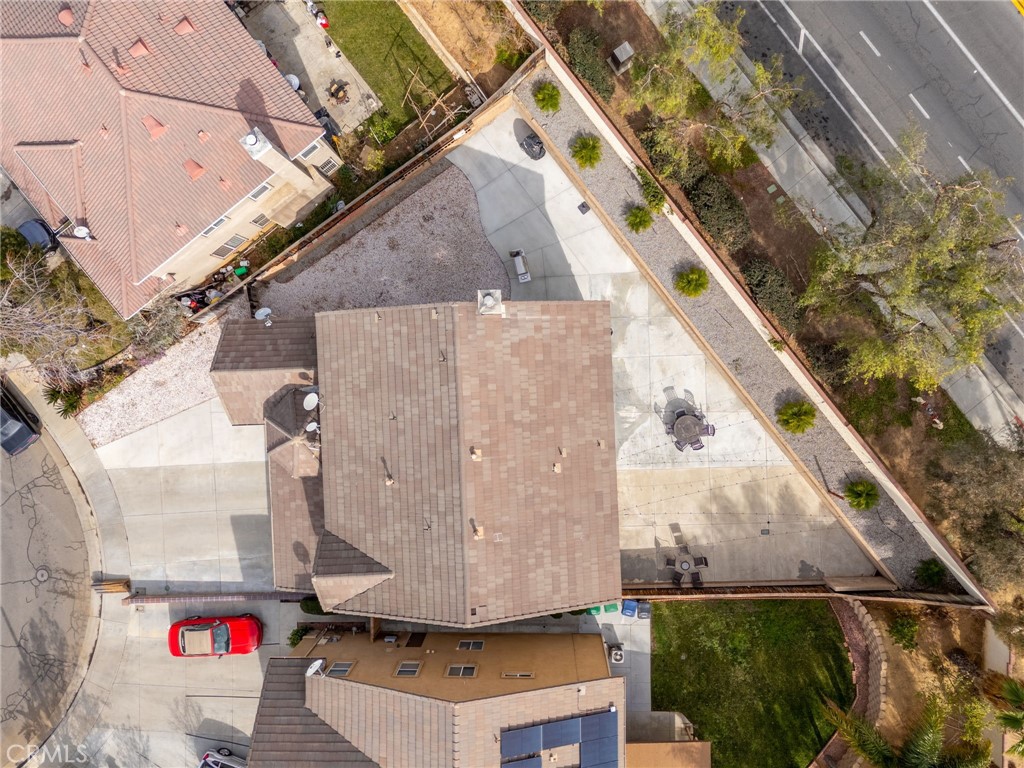 13490 Hawthorn Avenue Moreno Valley, CA 92553 - Photo 31 of 34 an aerial view of a house with a yard