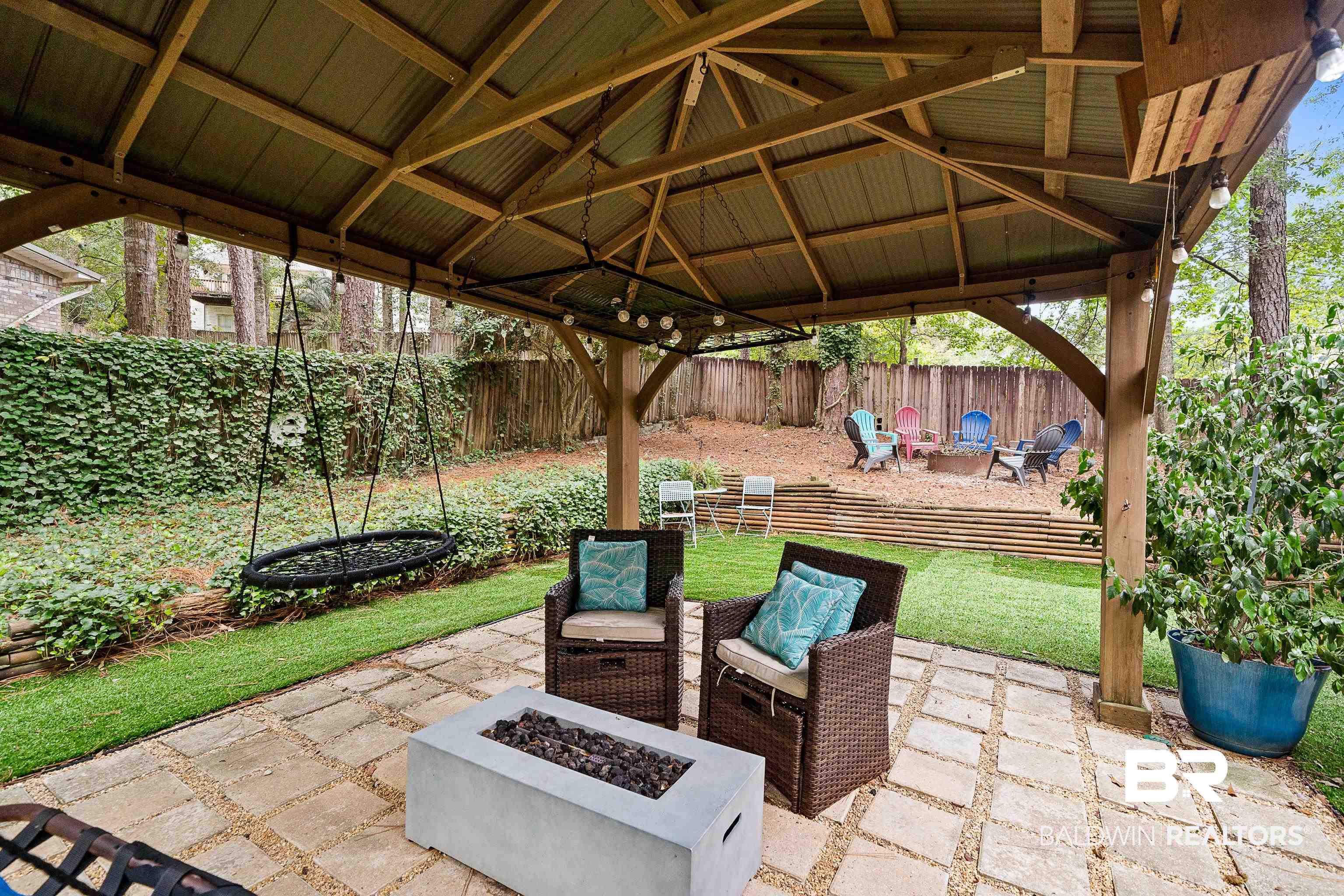 619 Ridgewood Drive Daphne, AL 36526 - Photo 42 of 47 View of patio / terrace with an outdoor fire pit