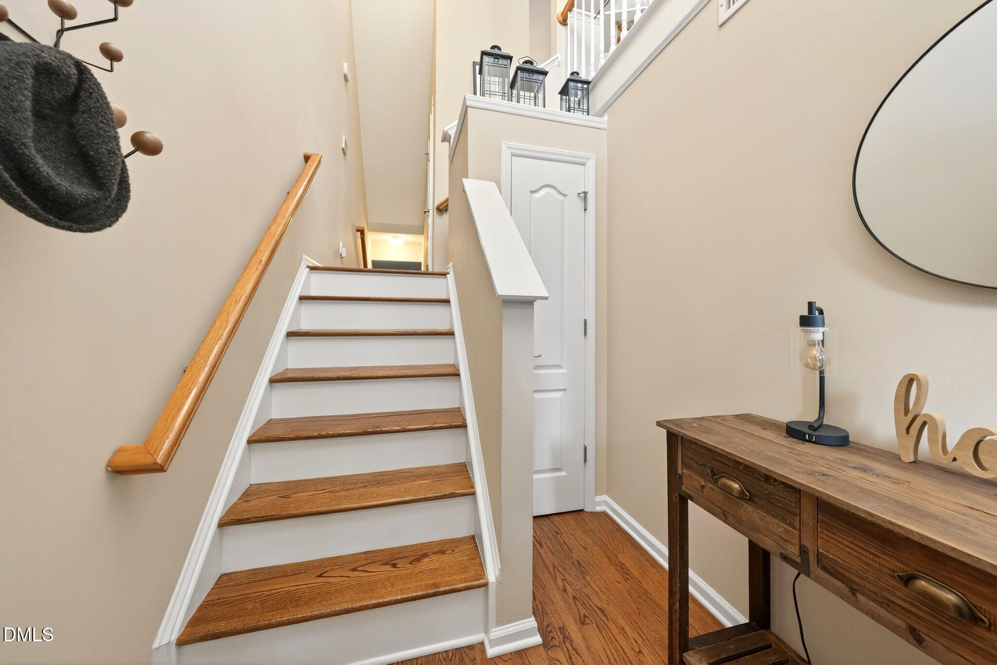 6851 Middleboro Drive Raleigh, NC 27612 - Photo 3 of 38 a view of entryway and hall with wooden floor