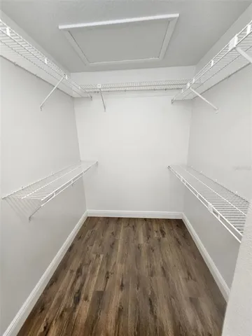 a view of an empty walk in closet