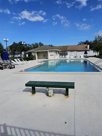 a view of a terrace with chairs