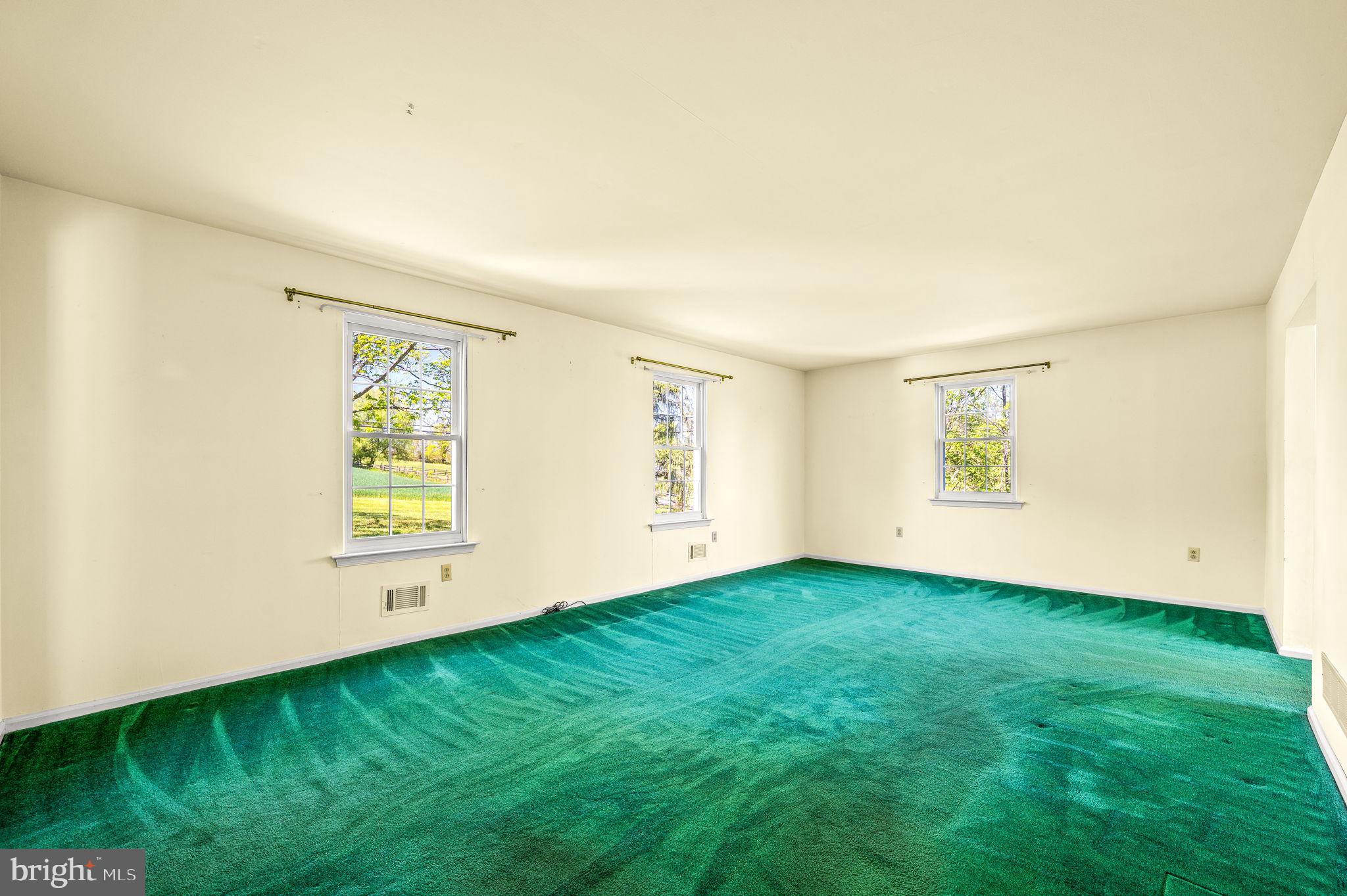 1094 Ebelhare Road Pottstown, PA 19465 - Photo 14 of 45 an empty room with windows