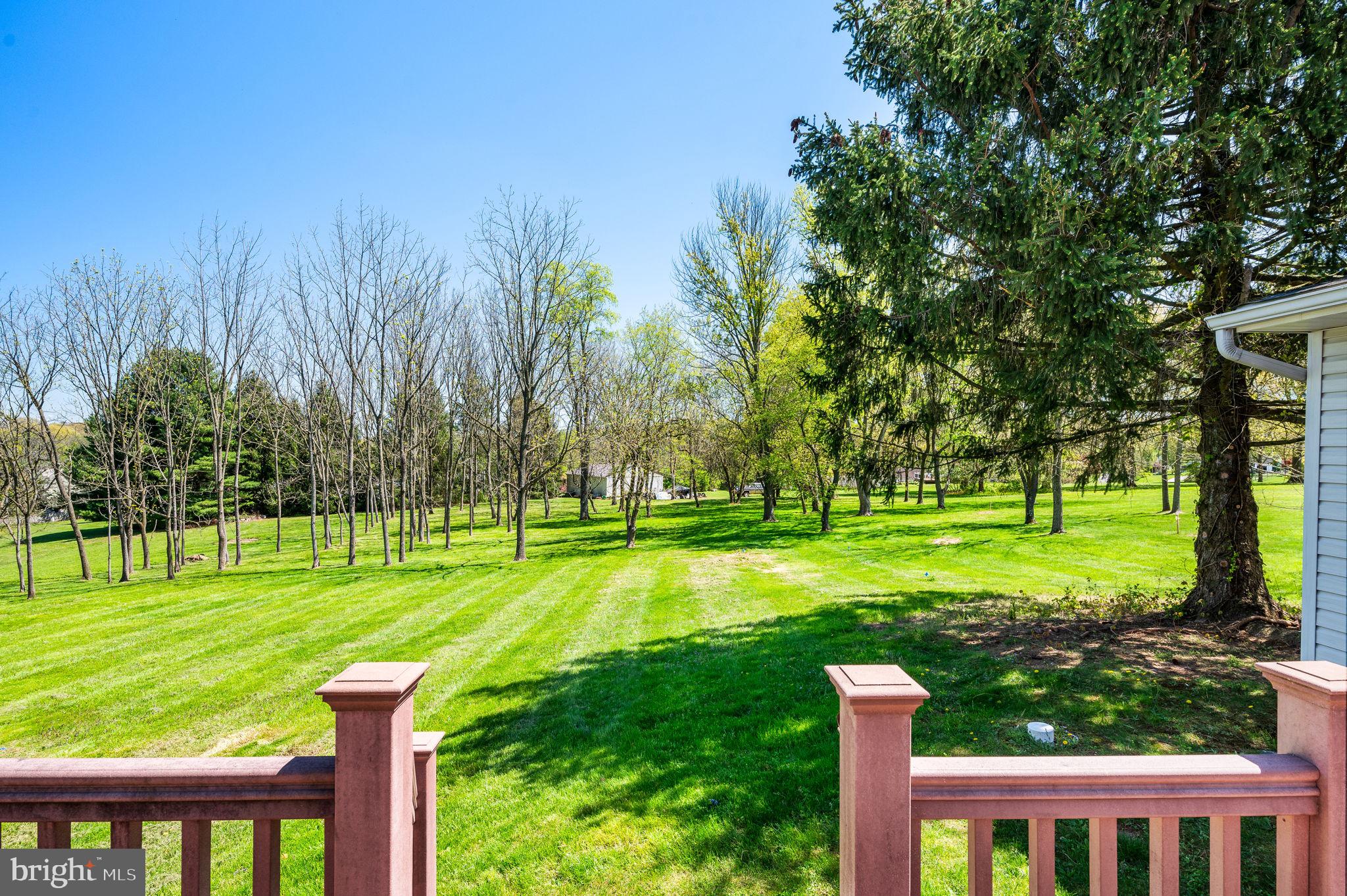1094 Ebelhare Road Pottstown, PA 19465 - Photo 31 of 45 a green field with lots of trees in it