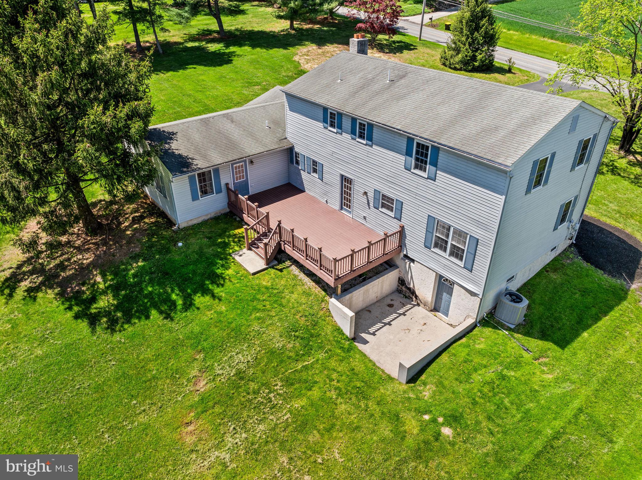 1094 Ebelhare Road Pottstown, PA 19465 - Photo 10 of 45 an aerial view of a house with a garden and trees