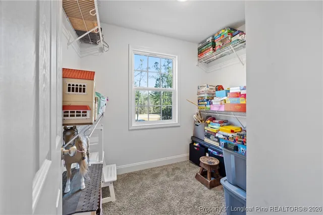 a room with toys and wooden floor