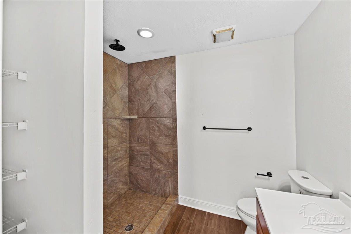 2521 Tomlinson Road Pensacola, FL 32526 - Photo 18 of 30 a bathroom with a bathtub and shower