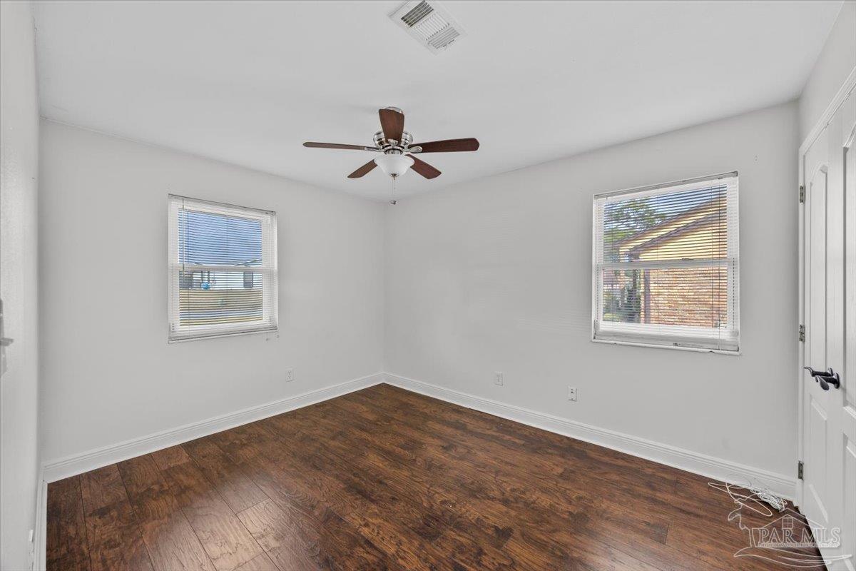 2521 Tomlinson Road Pensacola, FL 32526 - Photo 20 of 30 a view of empty room with wooden floor