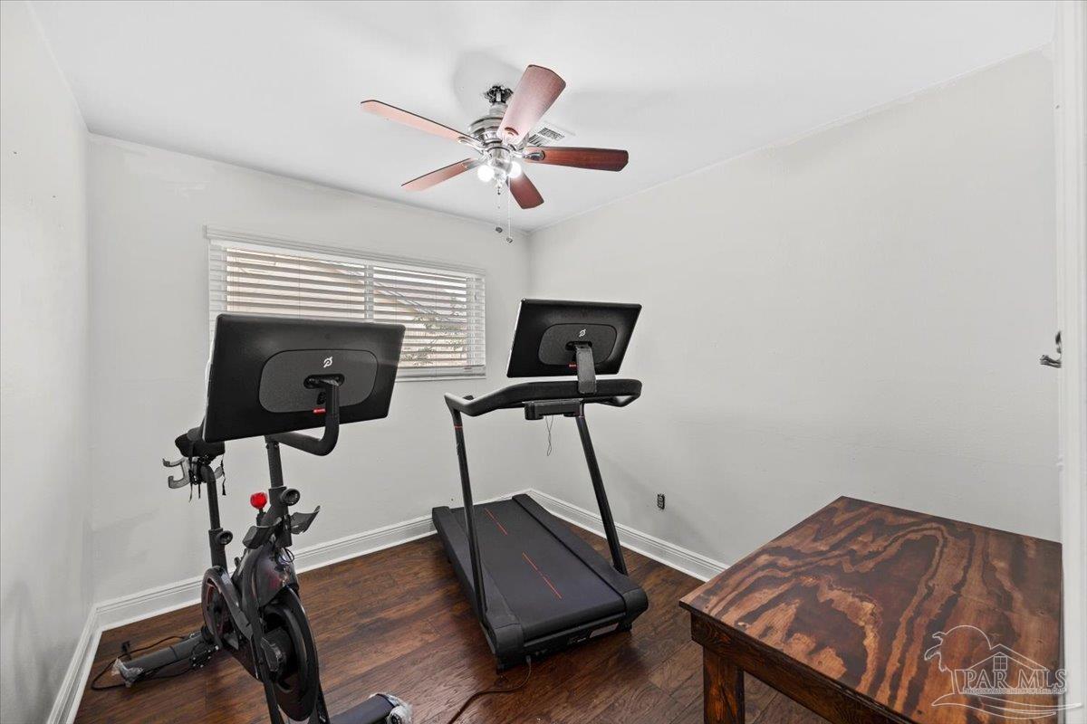 2521 Tomlinson Road Pensacola, FL 32526 - Photo 22 of 30 a view of a room with gym equipment