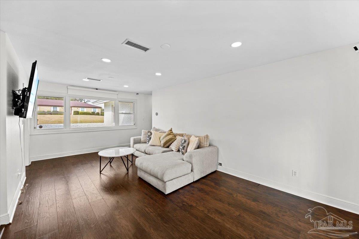 2521 Tomlinson Road Pensacola, FL 32526 - Photo 7 of 30 a living room with furniture and a wooden floor