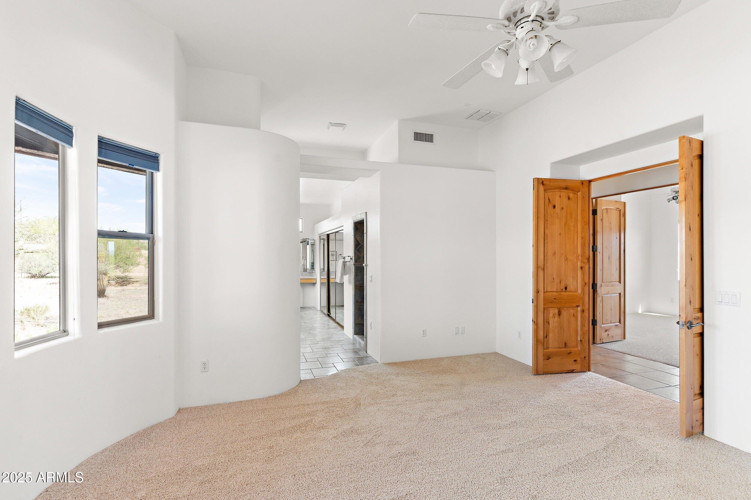 14036 East Ranch Road Scottsdale, AZ 85262 - Photo 18 of 32 a view of an empty room with a window