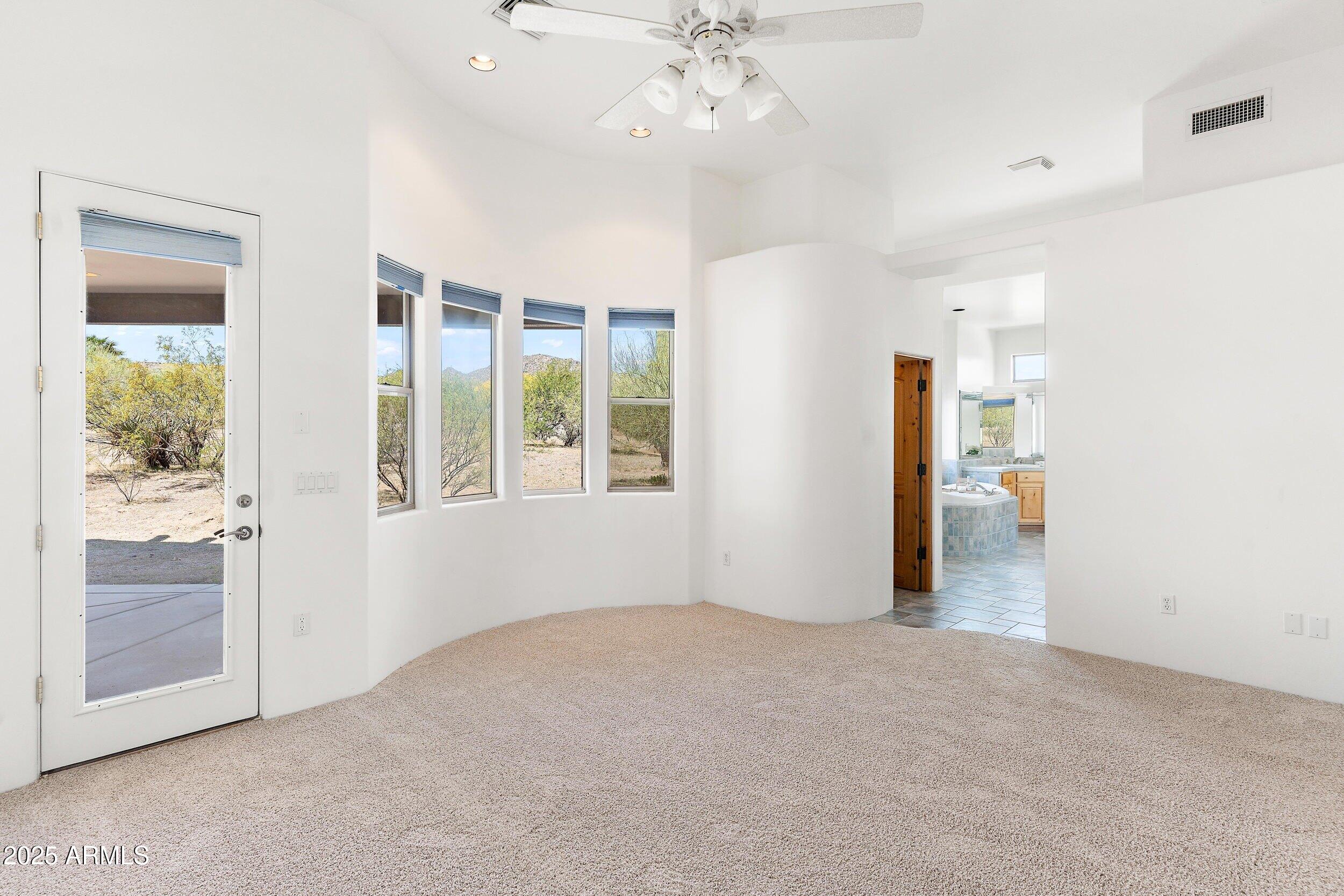 14036 East Ranch Road Scottsdale, AZ 85262 - Photo 19 of 32 a view of an empty room with a window