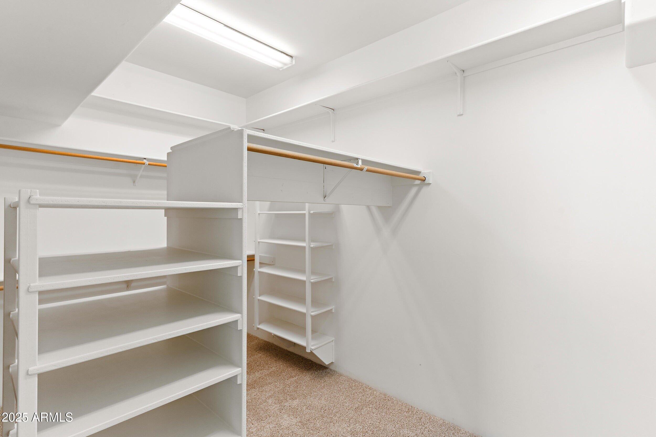 14036 East Ranch Road Scottsdale, AZ 85262 - Photo 20 of 32 a view of an empty walk in closet