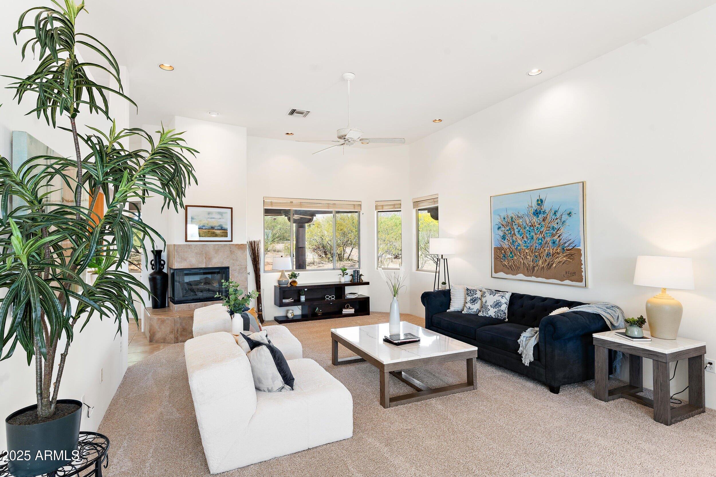 14036 East Ranch Road Scottsdale, AZ 85262 - Photo 2 of 32 a living room with furniture and a large window