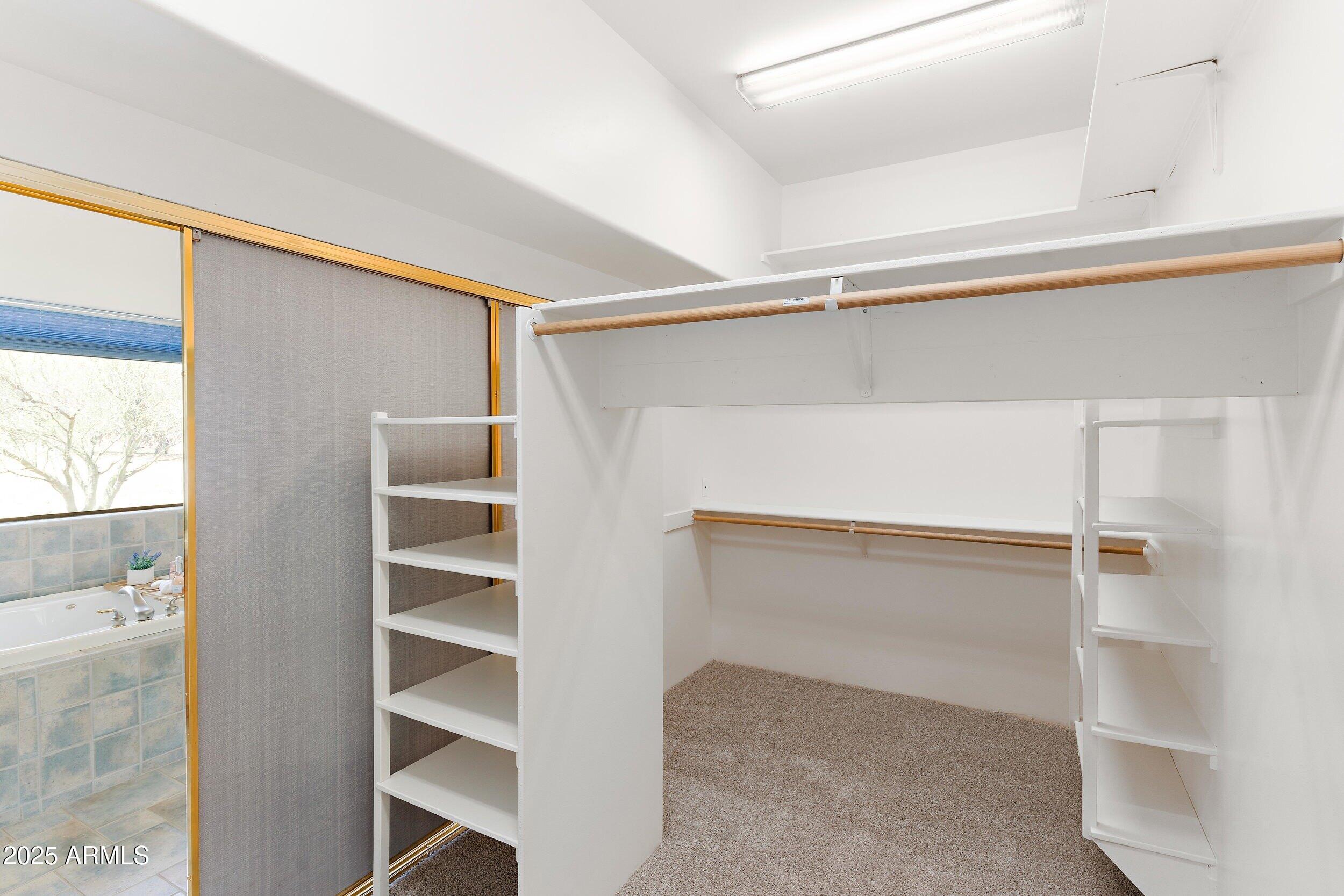 14036 East Ranch Road Scottsdale, AZ 85262 - Photo 21 of 32 a view of an empty walk in closet