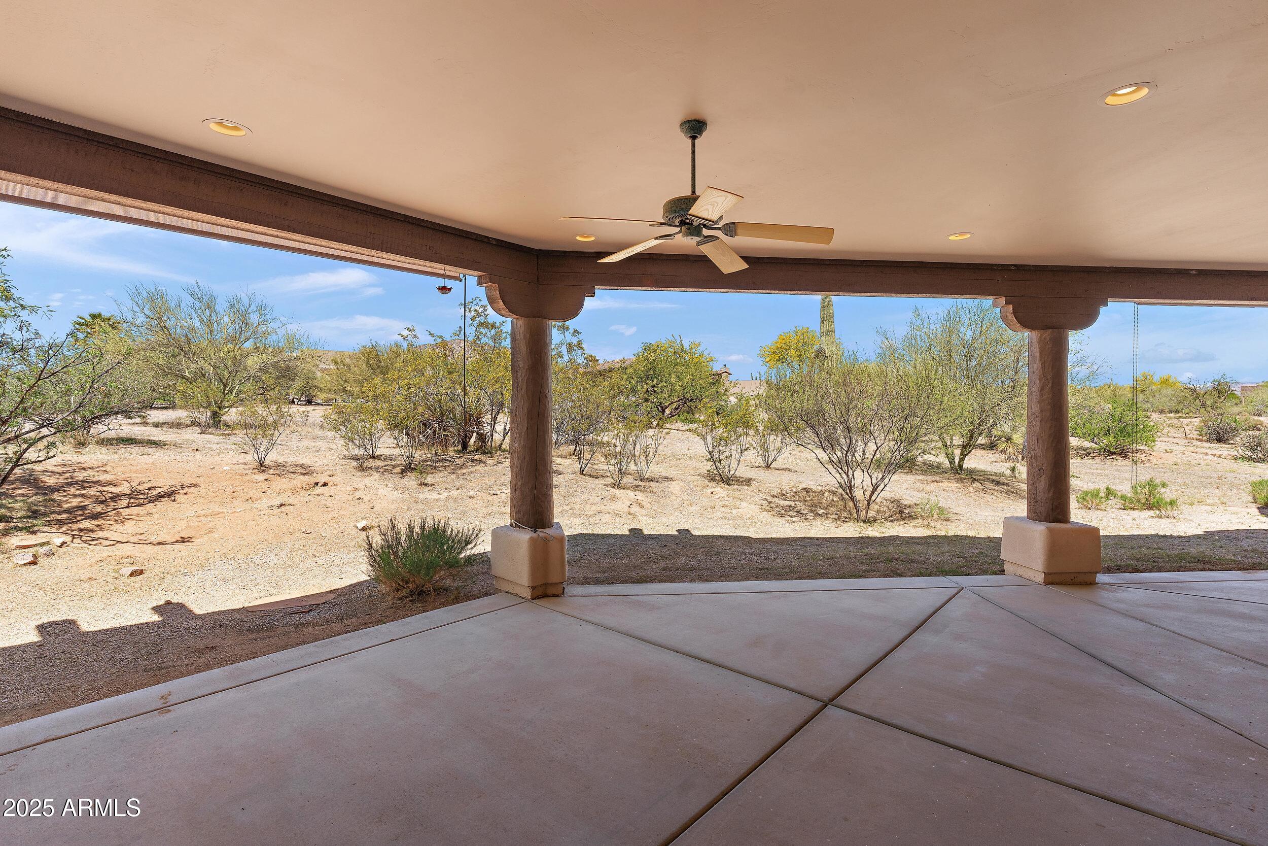 14036 East Ranch Road Scottsdale, AZ 85262 - Photo 24 of 32 a view of a floor to ceiling window and an ocean view