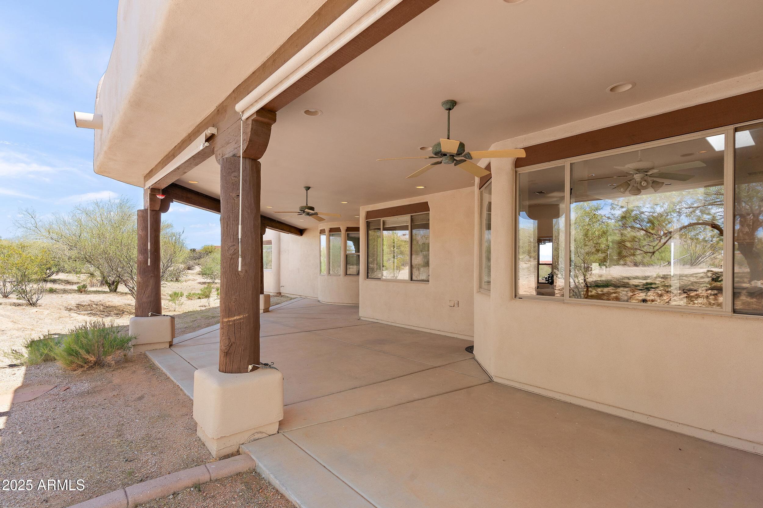 14036 East Ranch Road Scottsdale, AZ 85262 - Photo 25 of 32 a front view of a house with a porch