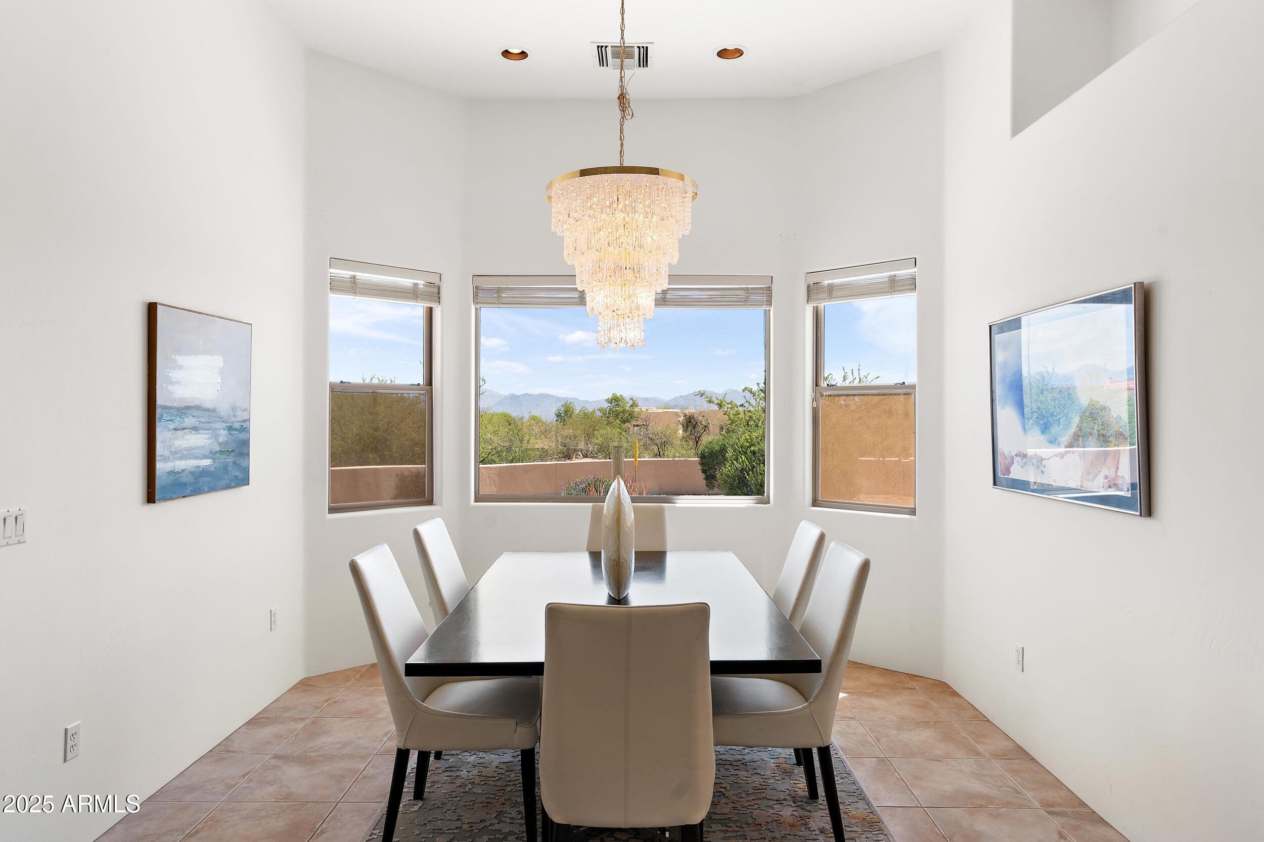 14036 East Ranch Road Scottsdale, AZ 85262 - Photo 3 of 32 a view of a dining room with furniture window and outside view