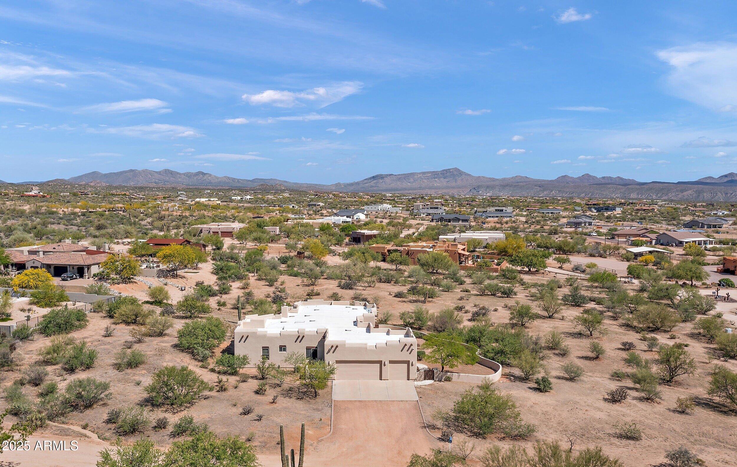 14036 East Ranch Road Scottsdale, AZ 85262 - Photo 32 of 32 an aerial view of residential houses with outdoor space and trees