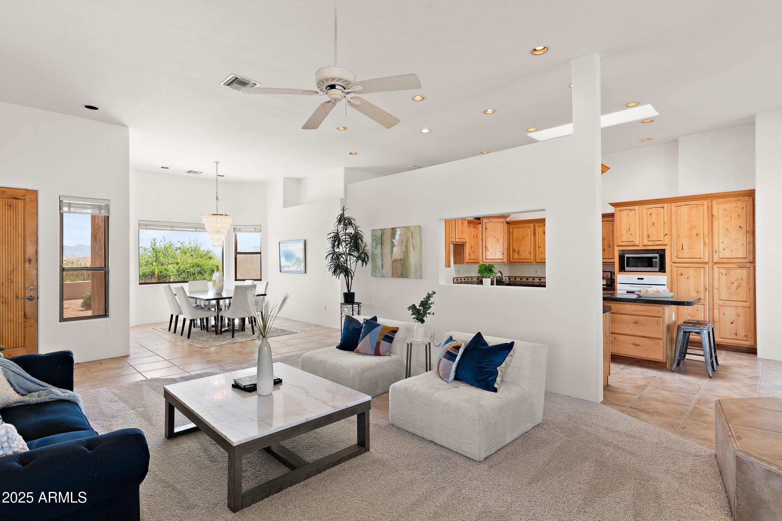 14036 East Ranch Road Scottsdale, AZ 85262 - Photo 4 of 32 a living room with furniture kitchen view and a large window
