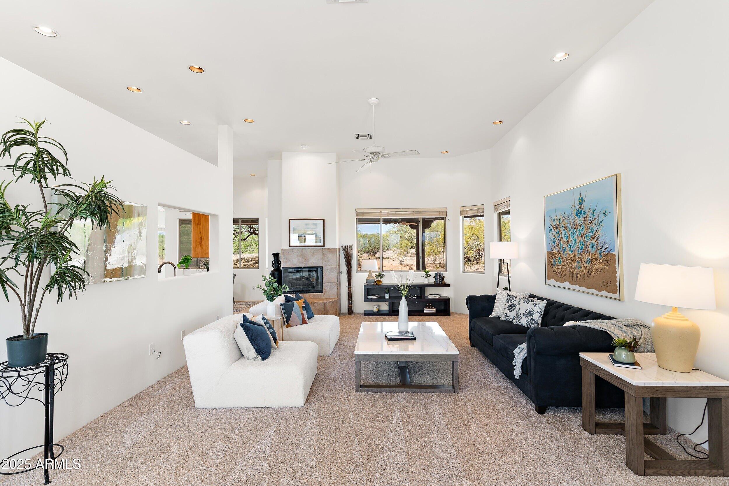 14036 East Ranch Road Scottsdale, AZ 85262 - Photo 8 of 32 a living room with furniture and a large window